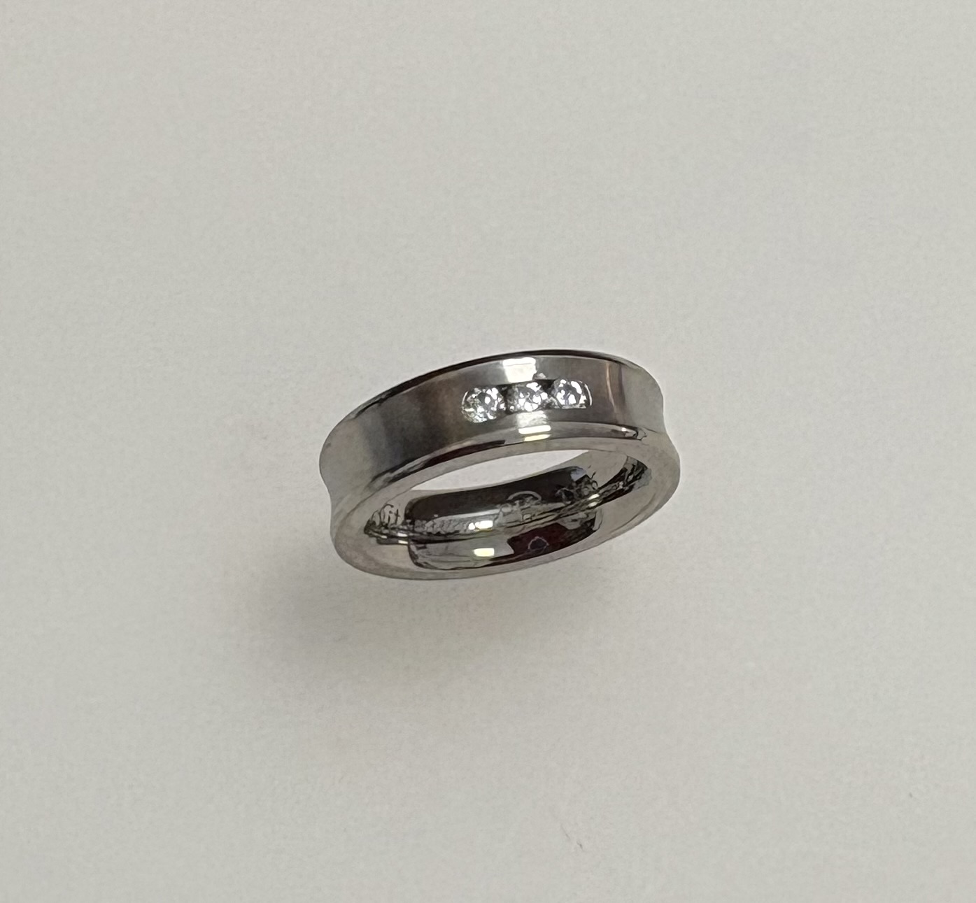 6mm concave shaped Titanuim ring with 3x Preciosa crystal stones